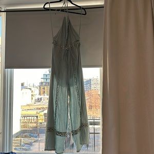 Green(ish) jumpsuit with gold accents